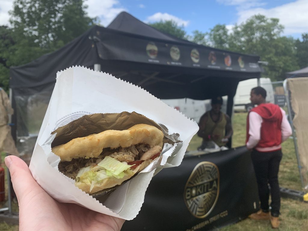 Close up of my Bokit from Bokit'la in front of their stall. You can see the spicy chicken, lettuce and avocado inside these gluten-free pockets (like a pitta!) Loved seeing them at Jam On Rye Festival